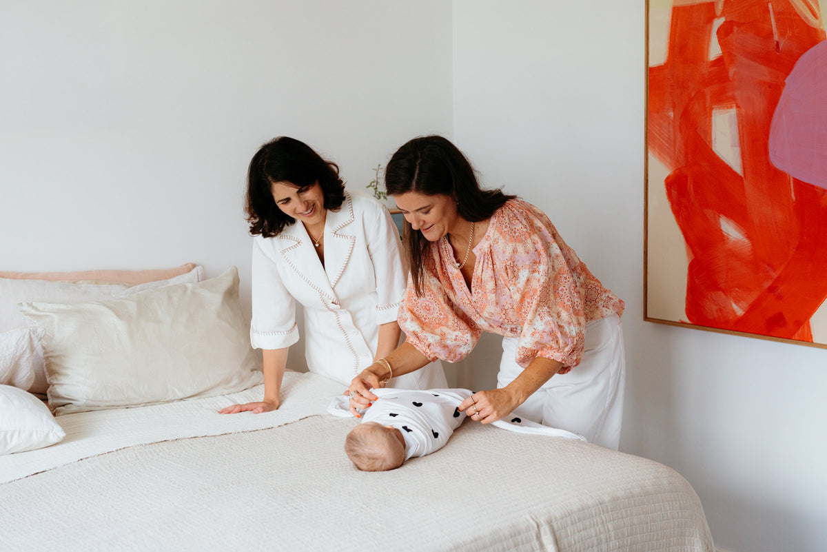 In-home consult shoot: settling baby two adults